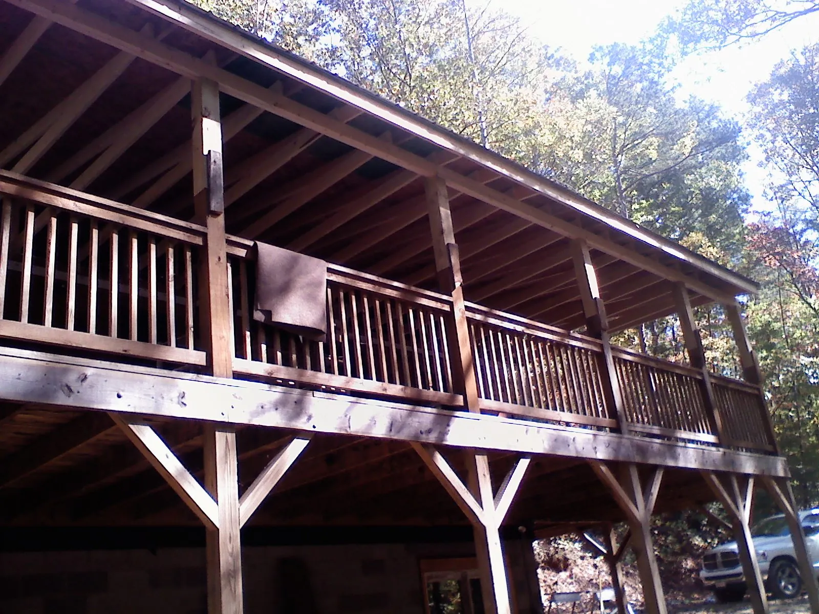 Timber framing under a new elevated porch and deck — Roof Leak Repair in Enderlin by Roofing Brothers